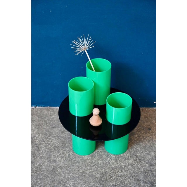 Graphic and unconventional, this side table reflects the playful and iconoclastic spirit of the 1980s. Its base is...