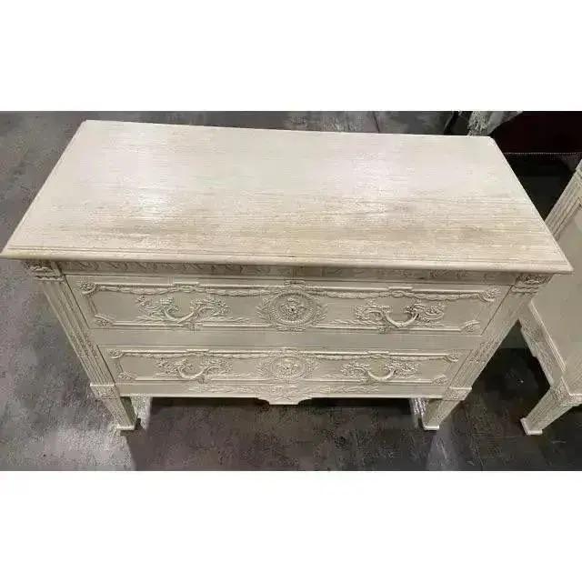 Offered is a vintage antique white chest by Interior Crafts. This piece features smooth gliding drawers and ornate carved...