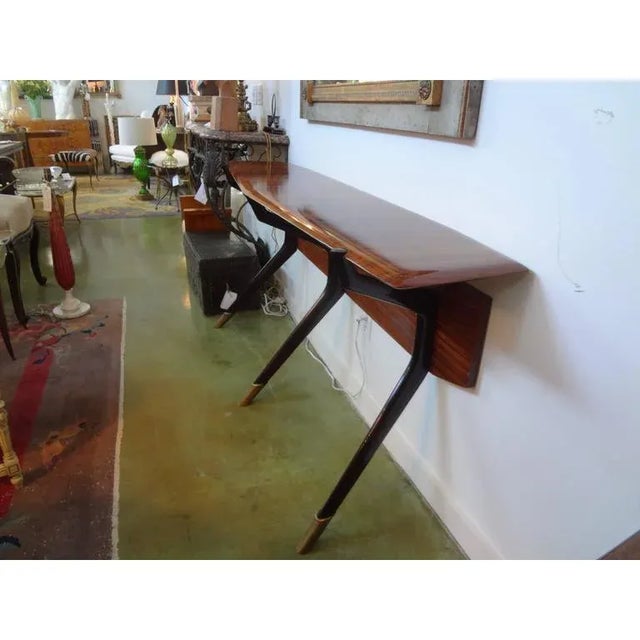 Stunning Italian mid-century modern console table attributed to Ico Parisi, Milan, with three legs terminating in bronze...