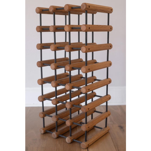 Very architectural looking vintage Danish modern wine rack. It's often attributed to Richard Nissen for Langaa of Denmark...