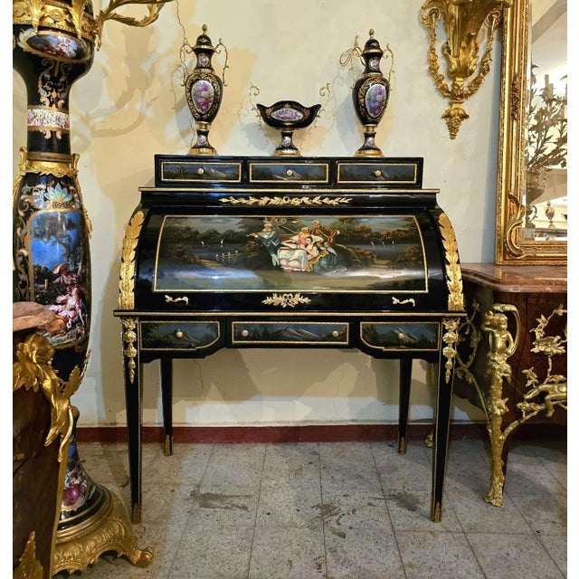 Elevate your interior with this breathtaking French Louis XV style roll top secretary desk, a true statement piece that...