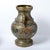 Large cloisonne bronze urn with intricate and bright colors.