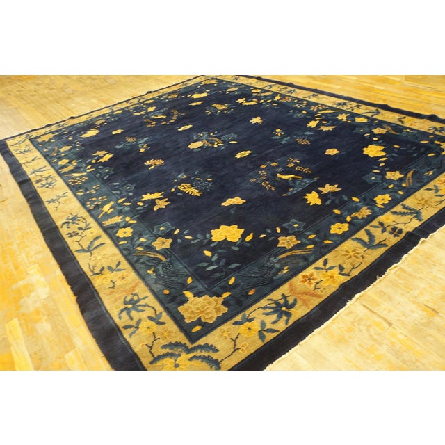 Blue Ivory Beige Cream White 1920s Hand Knotted Pile Rectangle Wool Antique Rug, Circa Date: 1920s. This magnificent...