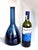 Offered is a deep midnight blue glass vase with a narrow long neck made by Holmegaard, Denmark. While it could be used as...