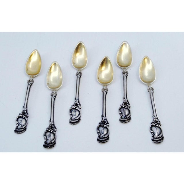Silver Coffee Spoons with Seashell Relief Handles and Golden Shells, Set of 6, in Very Good conditions. Designed 1890 to...