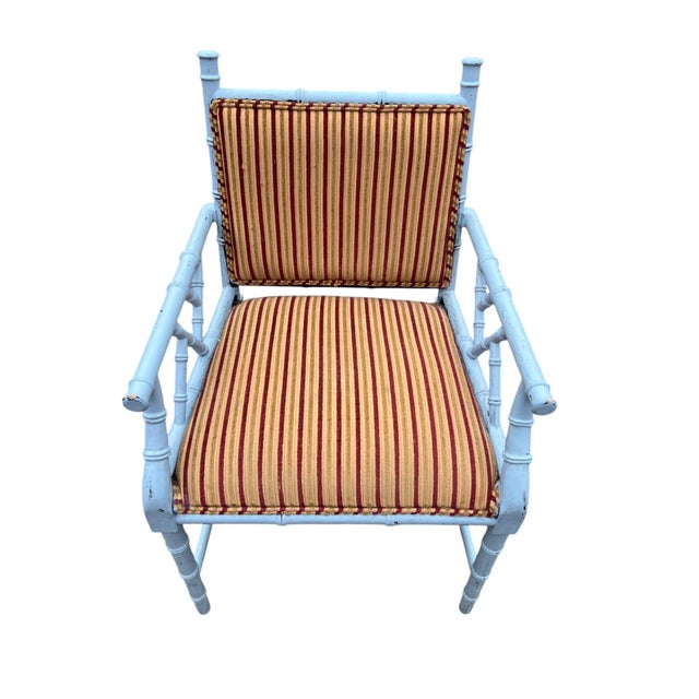 Nice style faux bamboo armchair. Great accent chair which can be used in any room. Use as is or Can easily change paint...