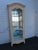 This China Cabinet is made of wood, solid wood, and glass. It was made by Ethan Allen, and it is labeled. The Cabinet has...