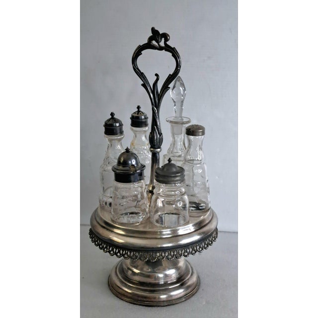 SKU: OT 3311 1870s Bancroft, Redfield & Rice Silverplate Cruet Castor Set 6 Etched Bottles, Rotating Stand This is an...