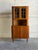 Beautiful vintage Danish modern teak corner cabinet made in Denmark, featuring an elegant space-saving design with...