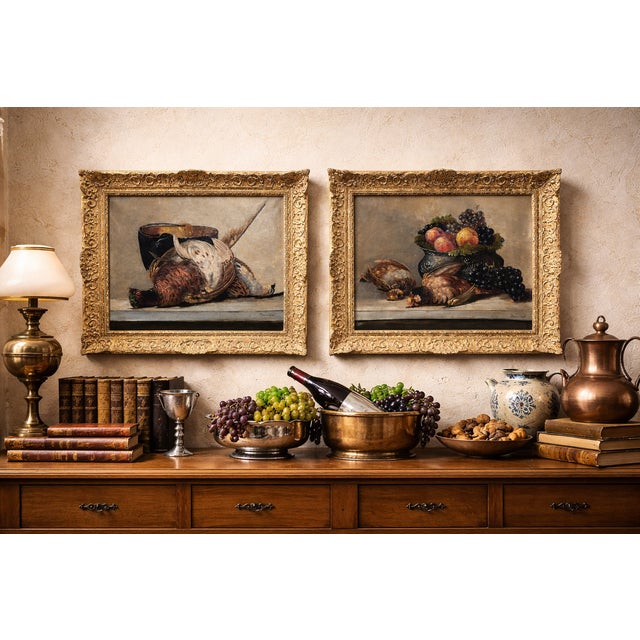 Pair of matching paintings by French painter André Chevalard, an artist renowned for his still lifes and hunting scenes in...