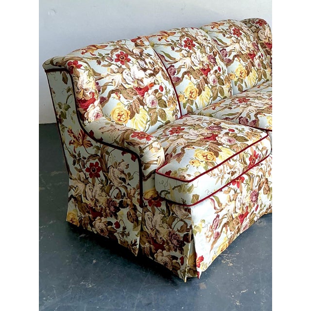 This vintage high-back sofa upholstered in iconic floral chintz by House of Hackney is a striking fusion of traditional...