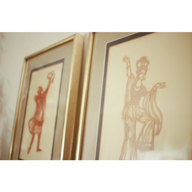 Presenting an exceptional pair of antique shadow puppets of Ottoman origins. These pieces capture dynamic figures in rich,...