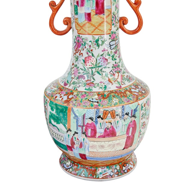 pair of early 20th large chinese cantonese vase lamps circa 1910. beautifully hand painted in green, pink and orange on a...