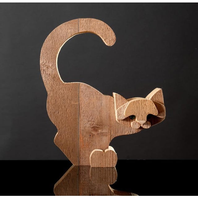 Cat wood sculpture Bottega Michelangeli, Orvieto Italy 1970s composed of assembled wooden sections, bear on the back...
