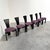 Remarks: Set of six Totem dining chairs by Torstein Nilsen for Westnofa, Norway 1980s. Black wooden frames with purple...
