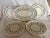 A set of 4 dessert or salad plates by Metlox in the Poppytrails pattern and a small oval serving dish.The serving dish is...