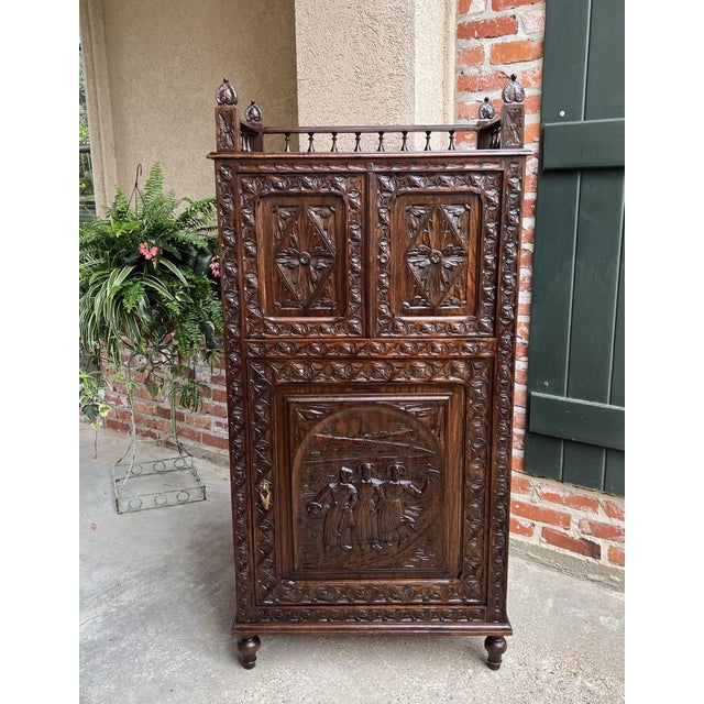 Antique French Carved Chestnut Cabinet Bonnetiere Armoire Breton Brittany. Direct from France, a highly carved “Brittany”...