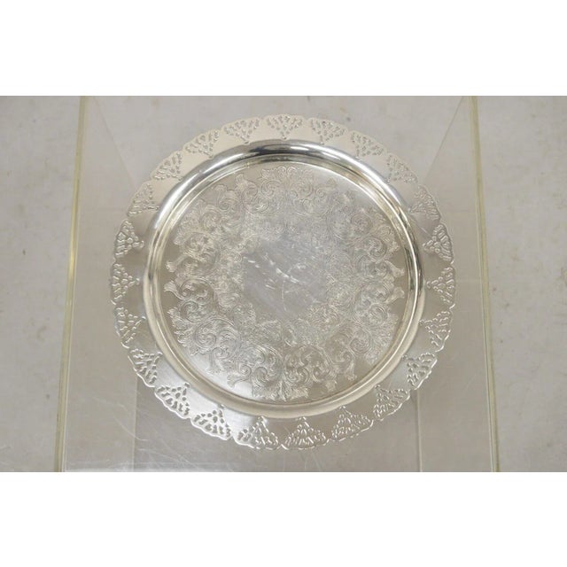 Vintage Home Decorators Inc Silver Plated Pierced Gallery Round Serving Tray. Circa Late 20th Century. Measurements: 1" H...
