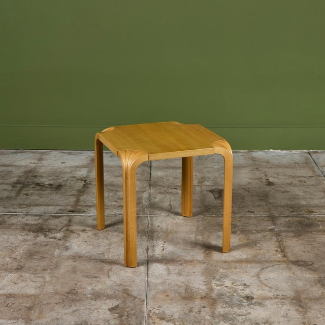 Originally designed in 1954, the "Fan Leg" side table by Alvar Aalto for Artek, Finland, c.1970s. The table features a...