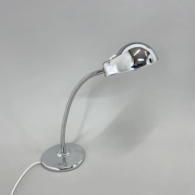 All-chrome table lamp, that is adjustable in all directions. New wiring, original switch. Bulb: 1 x E 25-27. Up to 250V...
