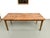 Superb farmhouse table, combining the authenticity of a thick, solid poplar top with the refined elegance of a tapered...
