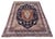 A fabulous antique Kirman Lavar carpet, woven circa 1910. The design features a large floral medallion on a deep indigo...