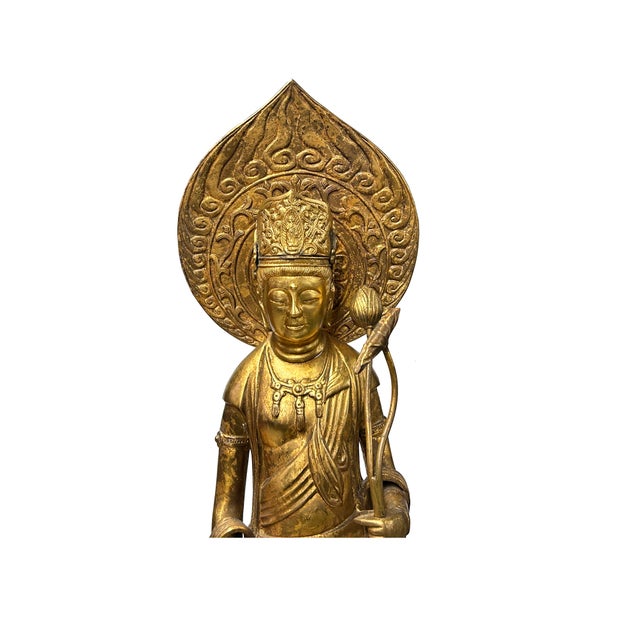 This striking, gilt-finished statue depicts Kannon (Guanyin), the Bodhisattva of Compassion, standing in a serene and...