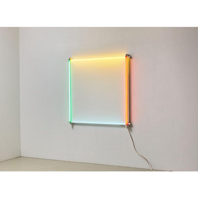 Stunning light object, called Outline, designed by architect and designer Aldo van den Nieuwelaar in 1983 for his own...