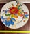 Oversized 16” MacKenzie-Childs Flower Market cake stand—iconic Courtly Check base and serious statement presence. Make a...