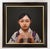 Archaic Prayer presents a serene portrait of a young woman, her expression contemplative as she holds her hands delicately...