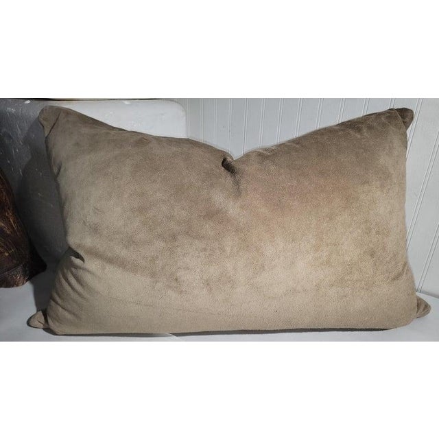 This large Navajo Saddle blanket bolster pillow is large in size and has a brown suede backing.The insert is down &...