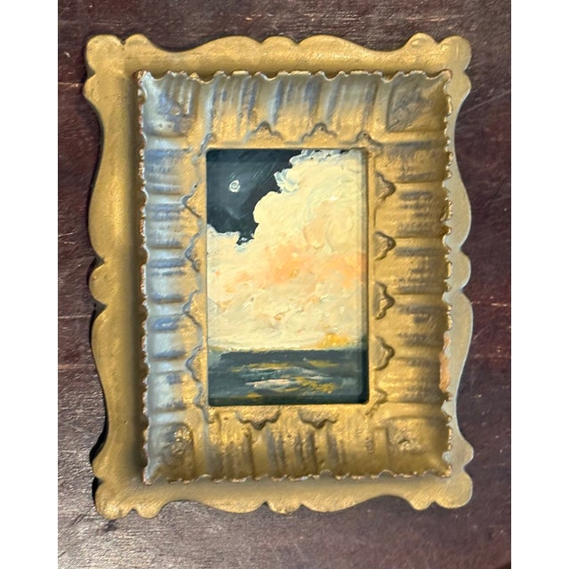 Mini drama at sea: you can hear the ocean and feel the cool breeze. Small full moon and large rolling, painterly clouds...