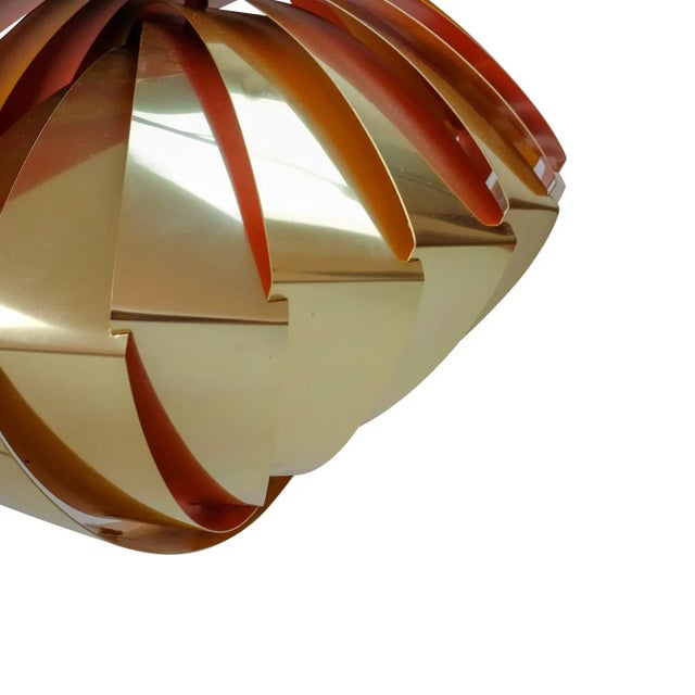 The Konkylie ceiling lamp was designed by Louis Weisdorf and produced by Lyfa in Denmark during the 1960s. The gold-...