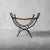 Beautiful mid-century French iron stool with woven seat. Perfect for an entry or as a seating element in a living room.