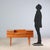 1960s English dressing table made of teak veneer, representing a classic example of British design from the era. The...