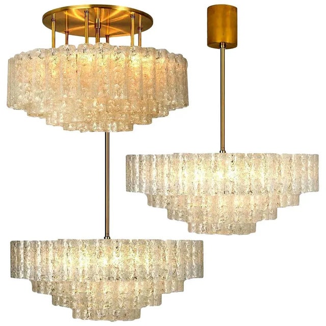 Wonderful set of three-light fixtures. One extra-large flushmount (d. 20.8"), and two chandeliers (d 25.6") by doria...