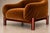 A sculptural pair of Brazilian Mid-Century Modern armchairs by Cimo, crafted in rosewood during the 1960s. Their generous...