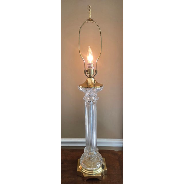 Stunning vintage glass and brass column table lamp. Combining architectural Neoclassical lines with the high-gloss glamour...
