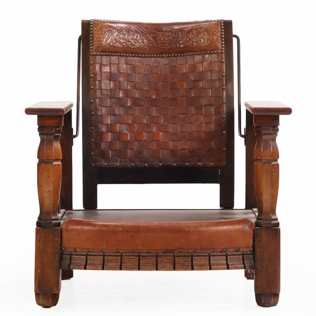 Robust lounge chair with a bold, bulky aesthetic, crafted with an oak frame for strength and presence. The back is...