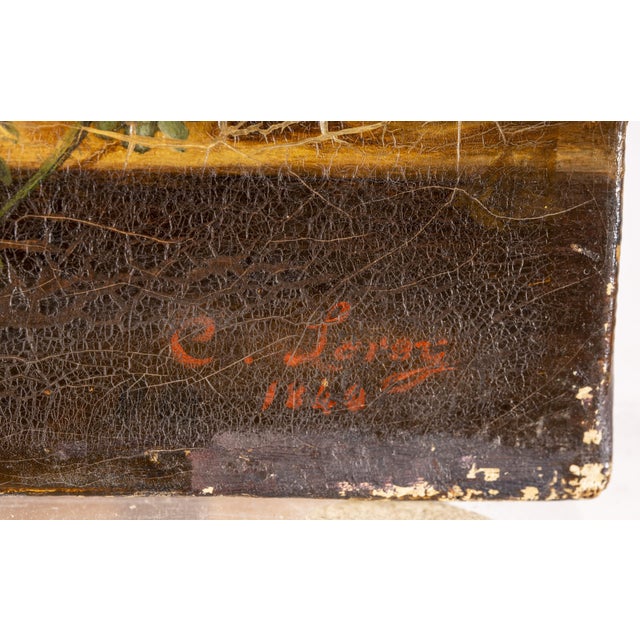 Signed and dated "C. Leroy 1840" in the lower right corner. A finely executed floral still life depicting an elegant...