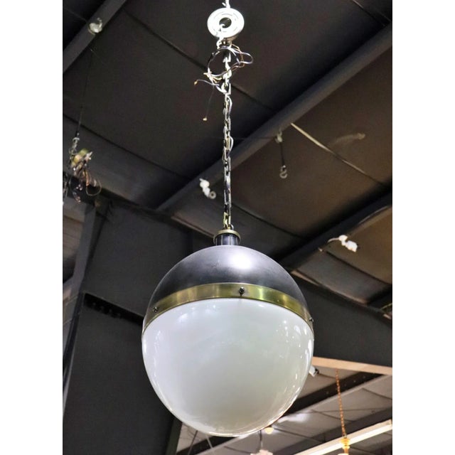 Description Glass. Mixed metal. Not counting chain measures 23" h x 17 1/2" diameter. Condition Scratches. Oxidation. We...