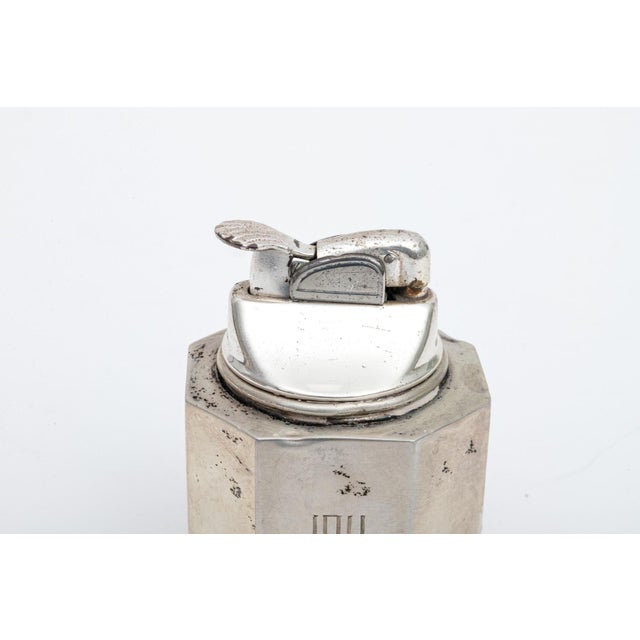A vintage weighted Tiffany & Co. silver table lighter with an octagonal faceted base engraved with a monogram “JRK" on one...