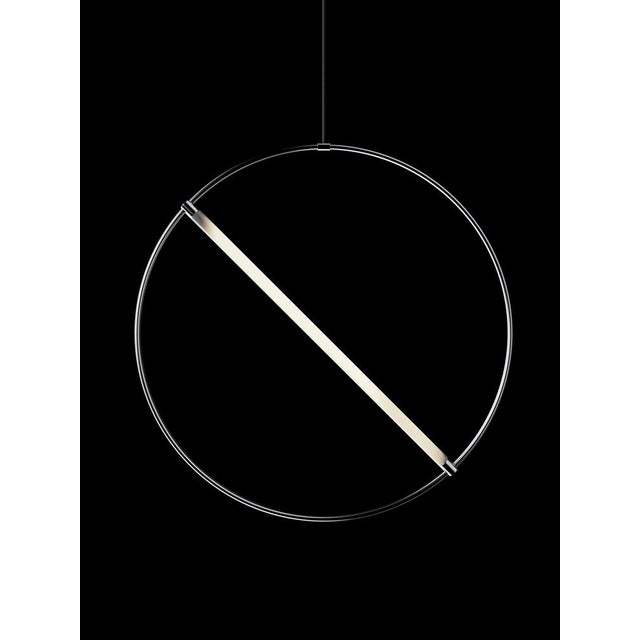 Ceiling lamp made by a chrome circular tube and a frosted light tube. European Plug (up to 250V).