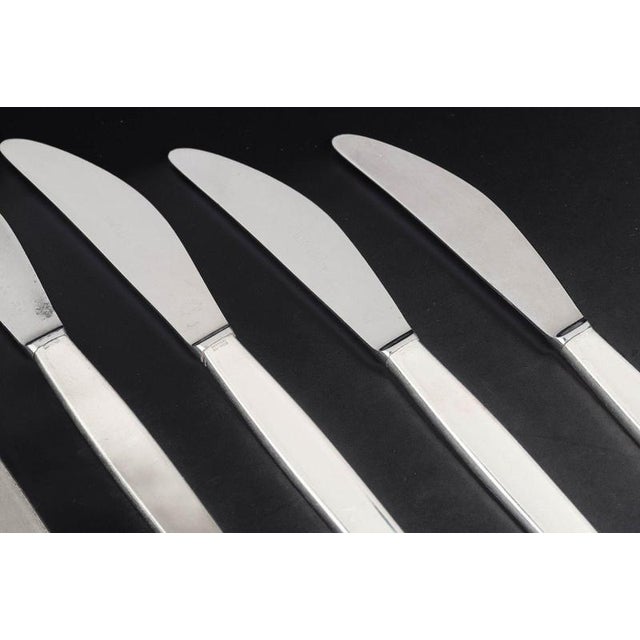 Georg Jensen, set of six lunch knives, Cypress. Set of six lunch knives in stainless steel and sterling silver in the...