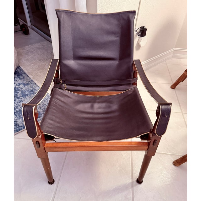 This is a great -looking and feeling Safari chair from the 1960's. Maker's Mark is on the back. The leather is in...