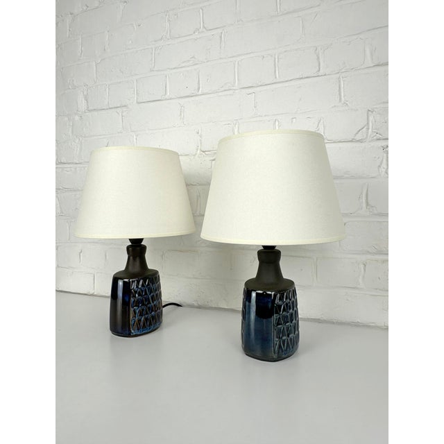 This pair of small ceramic table lamps was designed by Einar Johansen for Søholm Keramik, Bornholm, Denmark, during the...