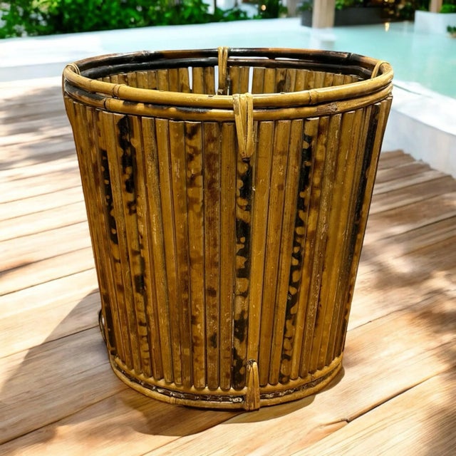 Vintage tortoise bamboo round basket. Pencil tortoise shell bamboo with split reed base. Rattan used to strap top and...