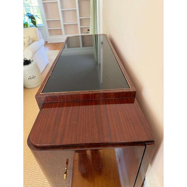 Exceptional Ralph Lauren Duke Bar cabinet in a stunning high-gloss mahogany finish with polished brass hardware and...
