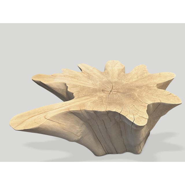 Impressive reclaimed bleached teak amorphous coffee table. A graduation from the bottom to the top. We have added a polish...