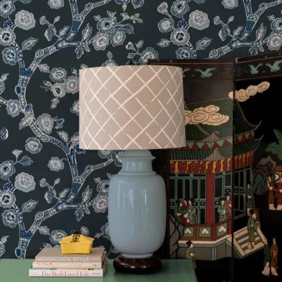 A sample of Temple Garden Navy Blue Wallpaper Care Instructions: Wipe with damp cloth.